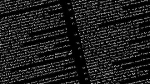 A page of numbered scientific citations in white type on black, rotated and cropped.