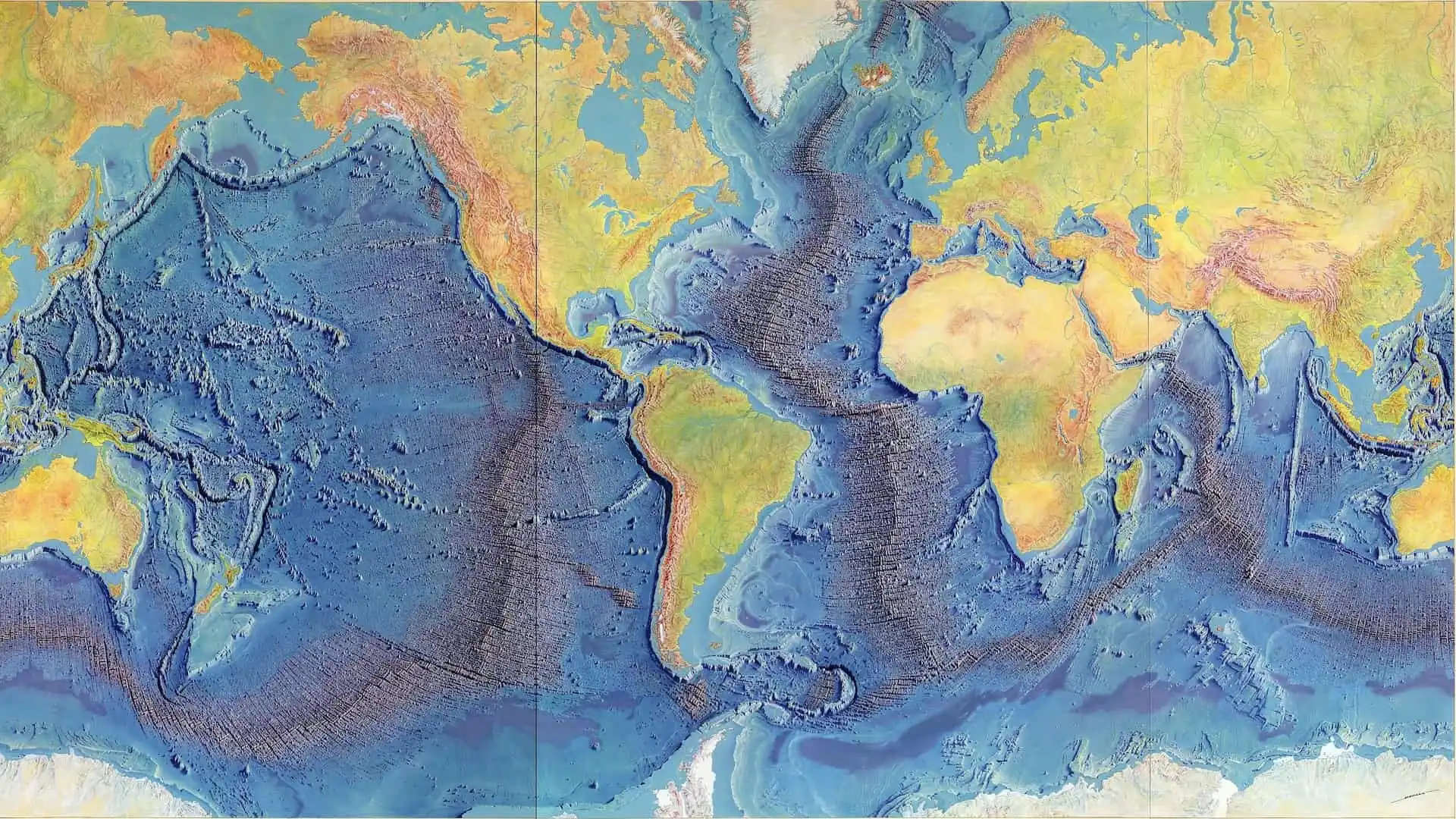 A stylized map of the world using paint and pencil, showing elevation differences and ocean floor depth