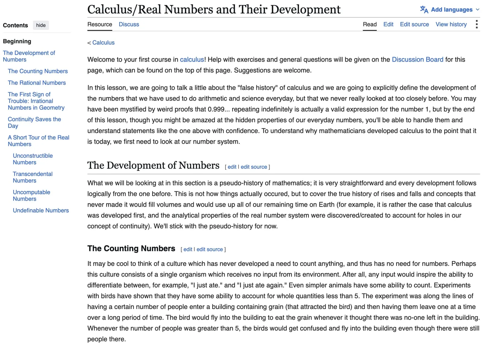 The lesson Calculus/Real Numbers and Their Development on English Wikiversity, opening with what the lesson covers and a contents rail listing each numbered concept from the counting numbers through undefinable numbers.